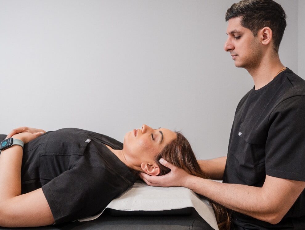 Osteopath Gerrards Cross, osteopath treating patient
